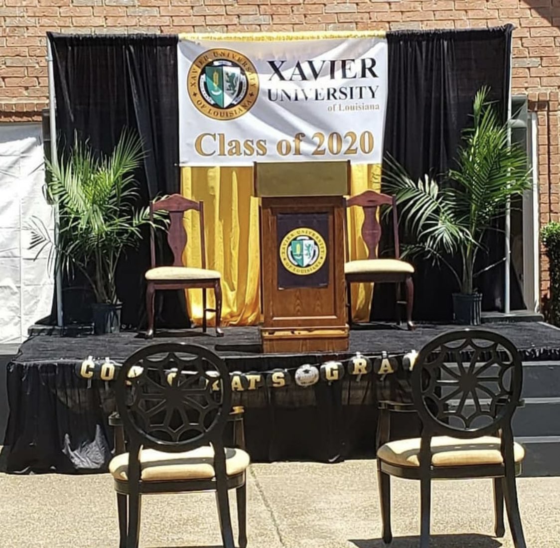 HBCUBuzz's tweet photo. This Xavier Dad made a way 💛🖤 #xavier #xula https://t.co/LUGFqYfA91