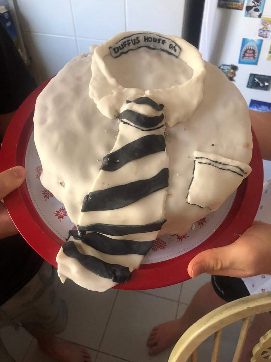 DuffusHouse's tweet photo. Winners of the Duffus themed baking challenge are the Wilding brothers in Dubai. A very creative effort at making the Duffus colours tie, with shirt. Love the added touch of the name tag! Well done boys and family for getting involved! #lookstasty #shirtwontstaywhiteforlong https://t.co/9p79qOBNa2