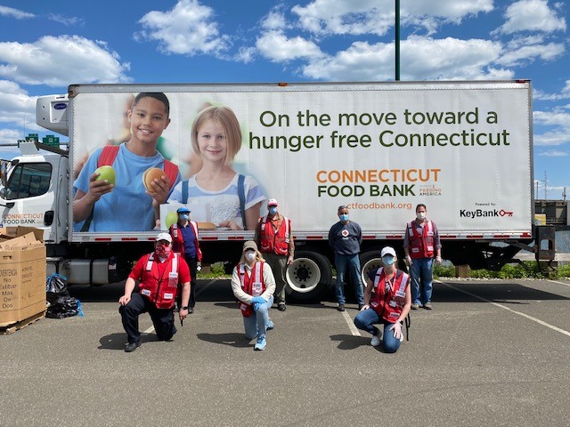 CTRedCross's tweet photo. #CTRedCross volunteers were a small part of  @CTFoodBank support last week in #BridgeportCT. Volunteers handed out @girlscouts 🍪, 🍞, 🥙! 1,500 Families Served + 50,000 Meals  + 3 Tons of food + Community Partners = Community Recovery. #covid19 #10MillionMeals https://t.co/utC4oqg84j