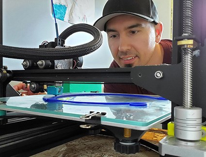 When classes at <a href="/TommyDTigers/">Tommy Douglas Collegiate</a> were suspended, Kevin Shmyr brought home 3-D printers to continue working with students. Since then, he has used them to print visors as part of a project to support health-care workers. READ MORE: ow.ly/TXMo50zCNUE #SPSLearnAtHome #spslearn
