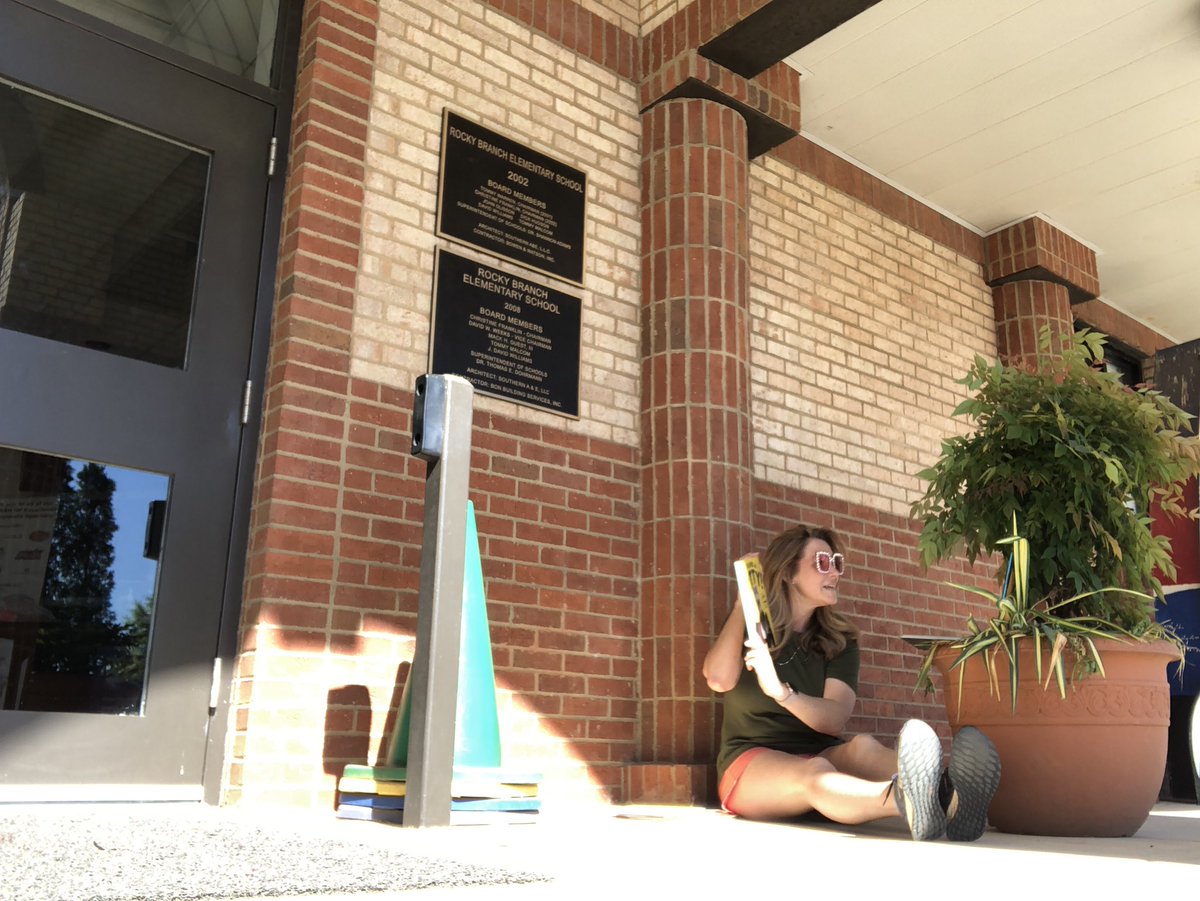 mbesmc's tweet photo. How much do I love my kiddos?Enough to sit on the cold cement ground and use an outdoor planter for a chromebook stand! I’d do it again in a ❤️beat. (BUT if you’re reading this AT&T, I’d prefer faster internet at my house.) 😬 #digitaldays2020 #readlikeaneagle #quaranteacherlife https://t.co/jJjLNTvZRB