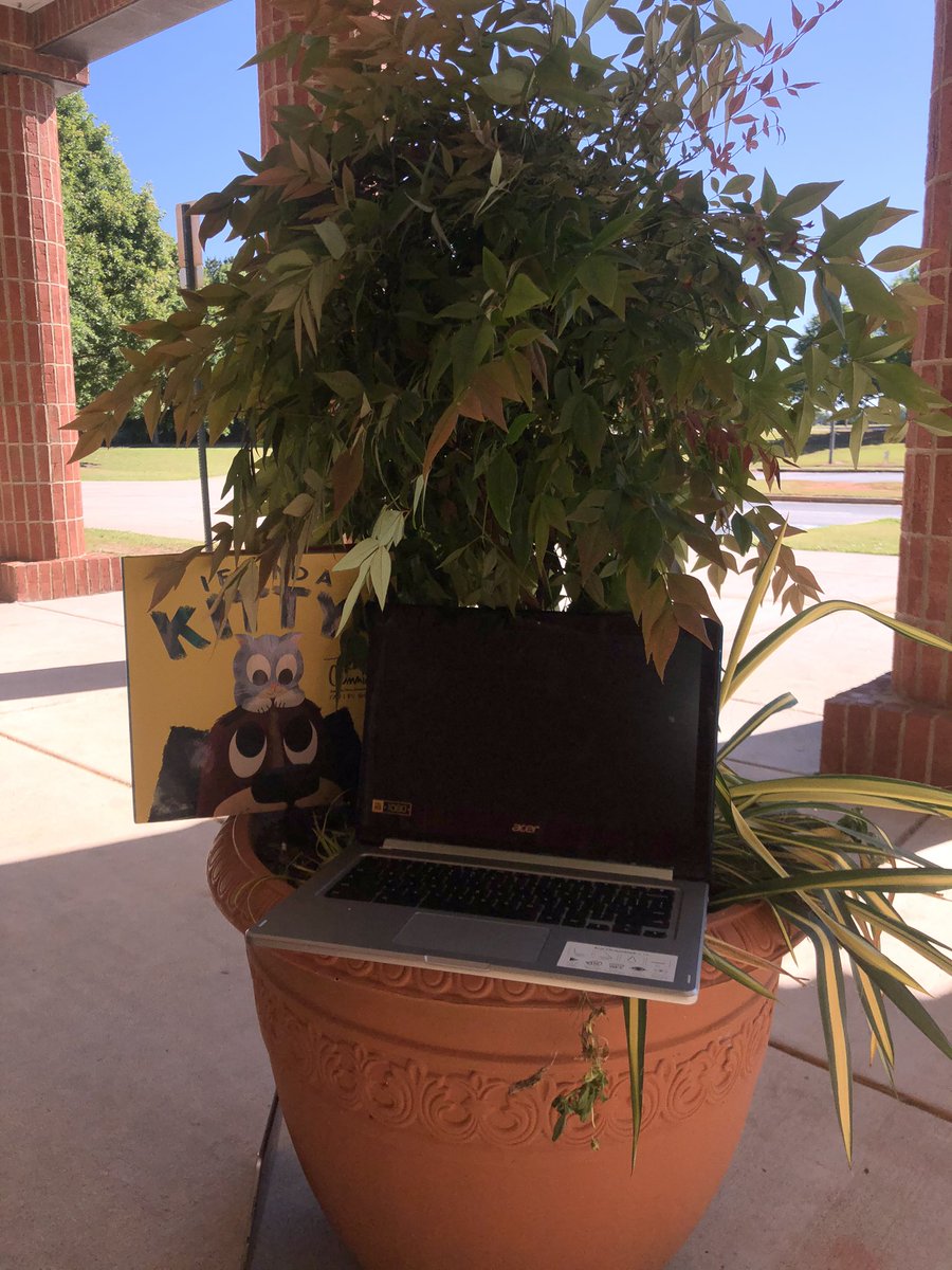 mbesmc's tweet photo. How much do I love my kiddos?Enough to sit on the cold cement ground and use an outdoor planter for a chromebook stand! I’d do it again in a ❤️beat. (BUT if you’re reading this AT&T, I’d prefer faster internet at my house.) 😬 #digitaldays2020 #readlikeaneagle #quaranteacherlife https://t.co/jJjLNTvZRB