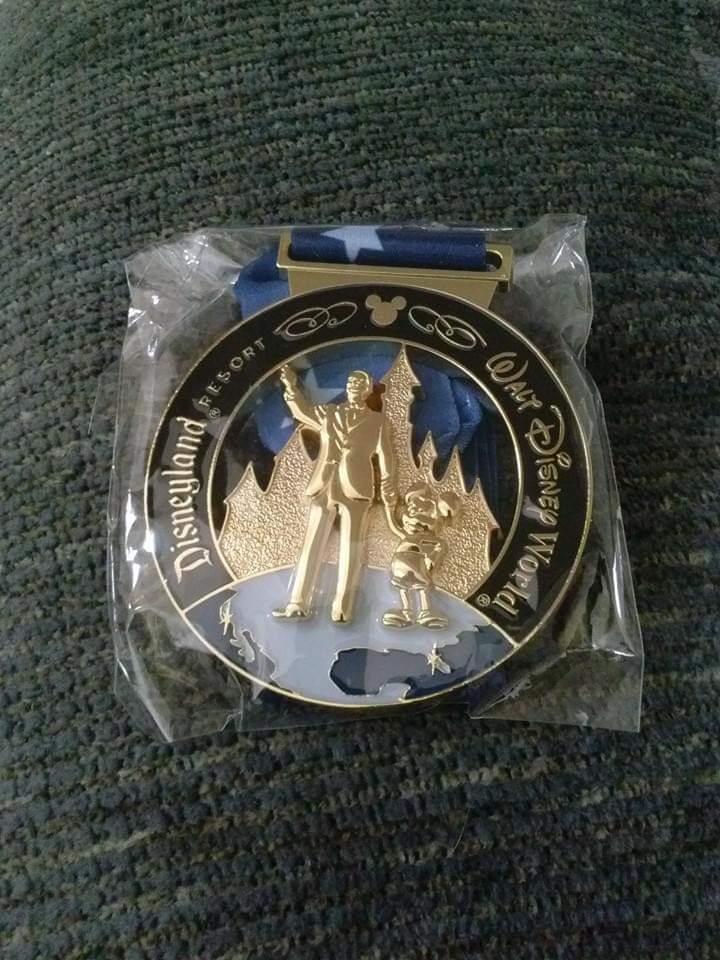cstephens2's tweet photo. I loved the shirts from the weekend of #Disneyland #rundisney #tinkhalf races including the inaugural #pixiedustchallenge. I've also included a picture of the regular #coasttocoastchallenge medal so you can compare. I earned that medal in 2016. #dailydoseofdisney #medalmonday https://t.co/Ak4QenyKhA