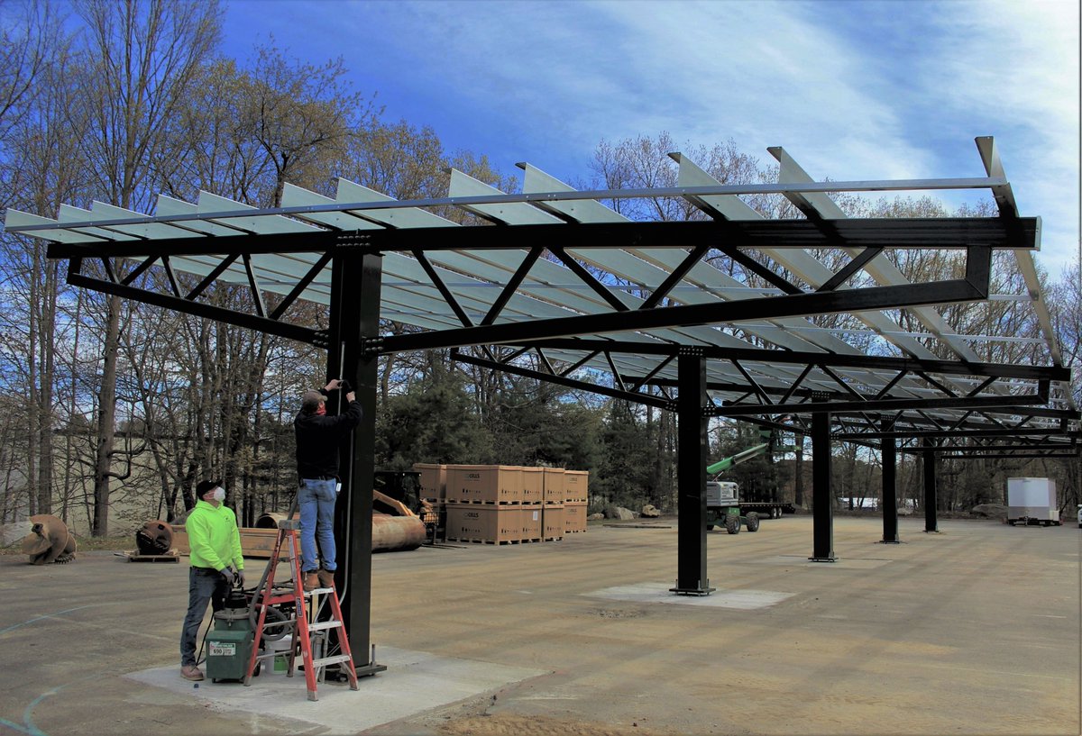 We're thankful for our partners at 621 Energy working hard to safely install a 239-kW canopy system over the parking lot at Congregation Beth Elohim in Acton, MA. #solarjobs #solarforall