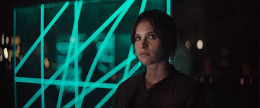 Alliance Intelligence knows of Jyn's connection to Galen and decide to spring her out of prison. She's unimpressed with the Rebel brass and doesn't appreciate being briefed while still in binders. I hadn't thought of that, lol.