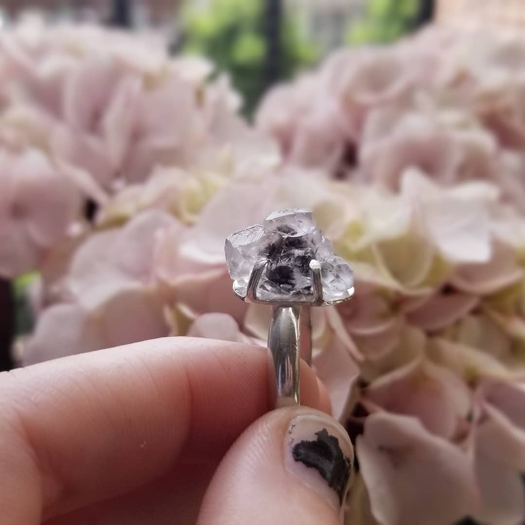 BLaceJewelry's tweet photo. This ring is a custom piece. The stone is the client's own, a gorgeous piece of included quartz. 🖤 
#quartz #rings #crystals #Silver #jewelry #jewelrydesigner #jewelrydesign #custom #customized #artistsontwitter #artists #sterlingsilver #silversmith #Spring #Flowers #flowerpetal https://t.co/bhNJcbufkG