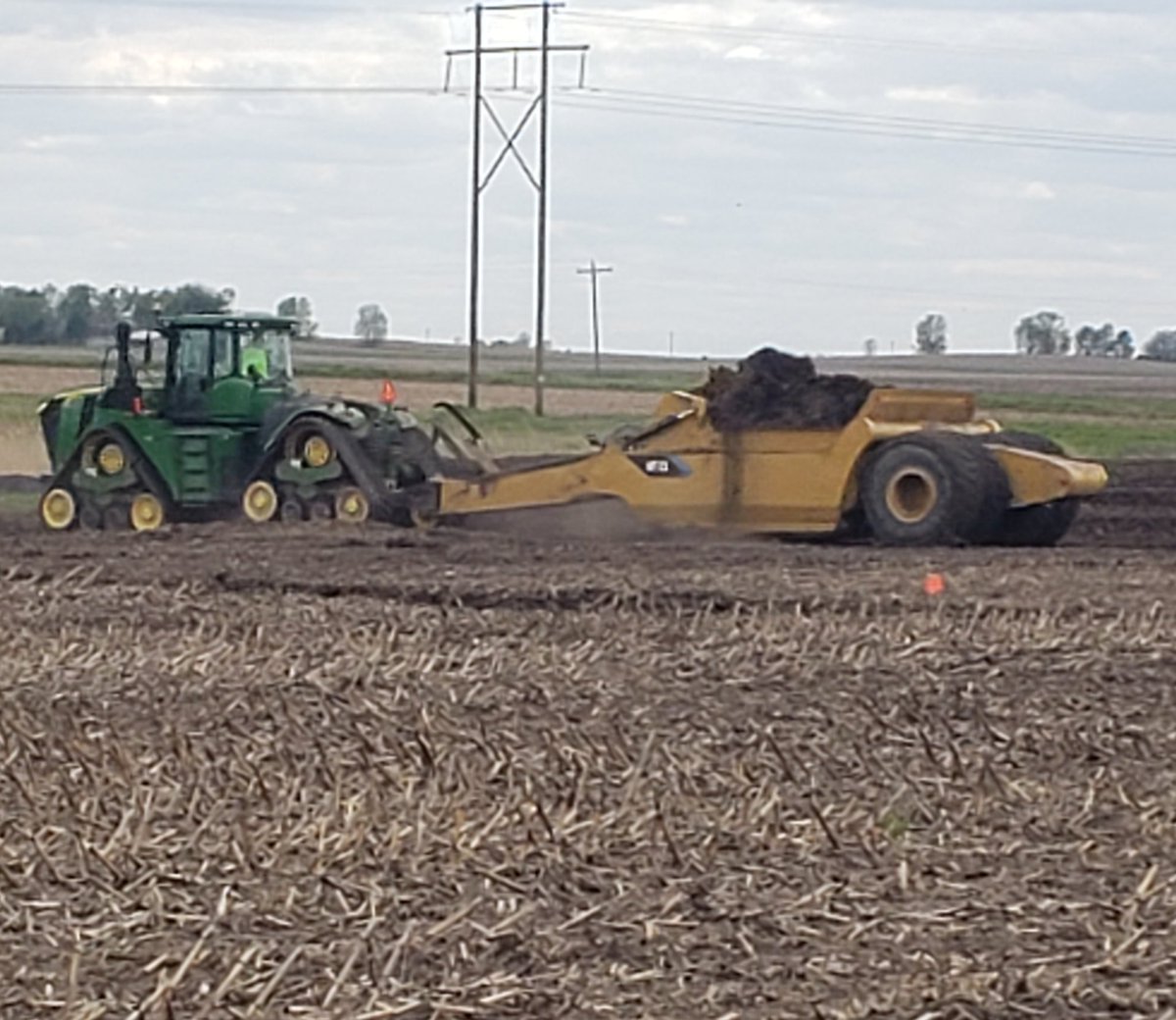 billsallenger's tweet photo. Stripping Topsoil at new Substation Project @Go__USA #caterpillar #JohnDeere #mtsscrapers #movingdirt https://t.co/wxhTGqSlBW