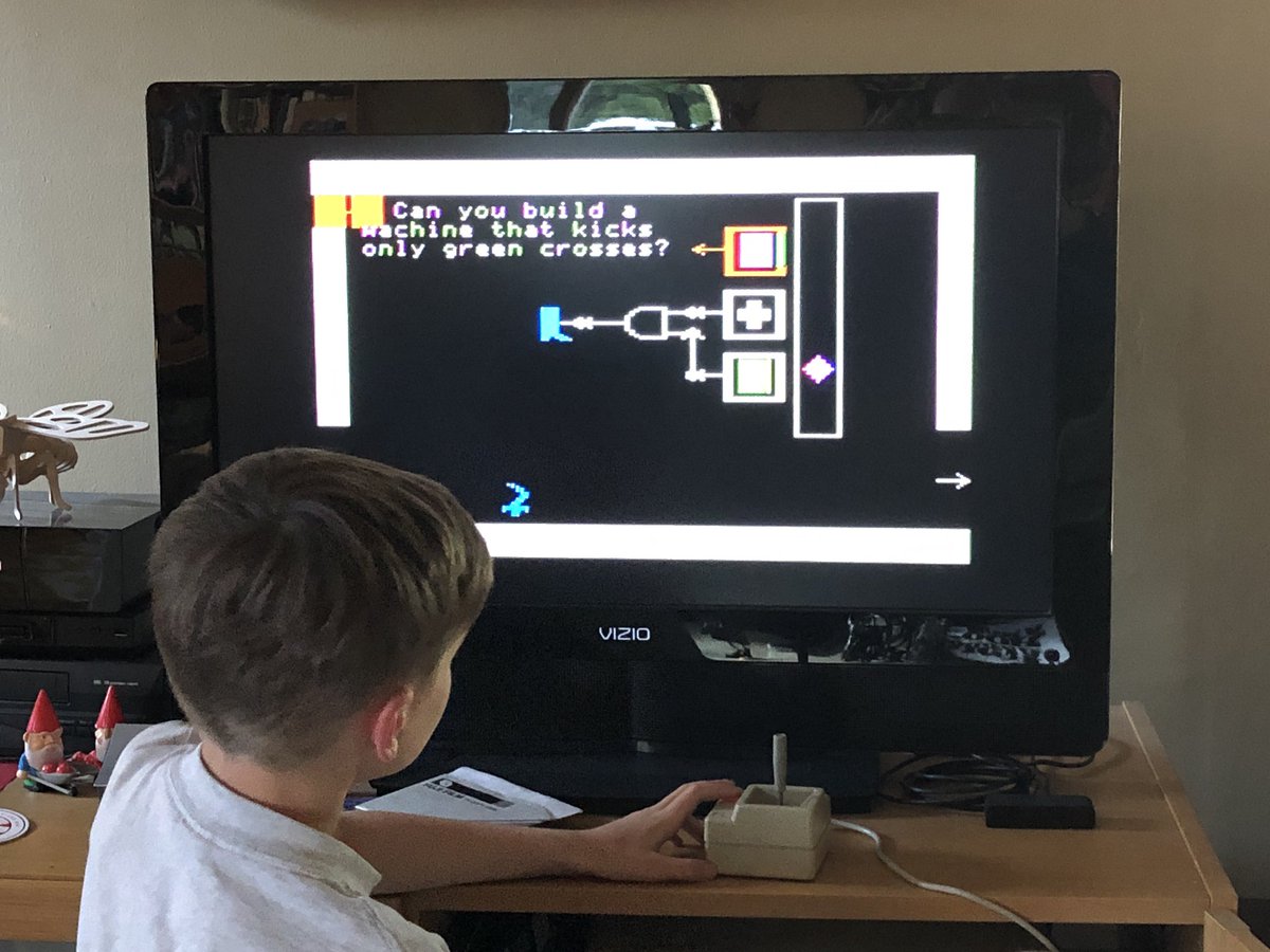 joshburker's tweet photo. I started my son on “Rocky’s Boots” on the #AppleII today: he is learning about And, Or, and Not gates. no Apple //e at home? No problem: https://t.co/g6KWbXDq6j #makered #circuits #machines https://t.co/E4eJfqYZFG