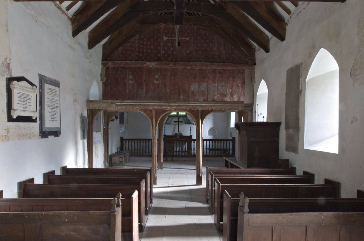 Deep in the Black Mountains is an ancient oval churchyard. It encloses a sandstone rubble church that has clung to the slope for over 800 years. A sundial by the porch has been telling the time since 1686. Inside, an oxblood roodscreen has survived against the odds. #thread