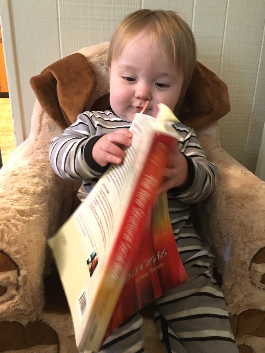 Starting them young! Eli reading “the New Structural Social Worker “ by Mullaly (aka the Social Work Bible) #futureactivist