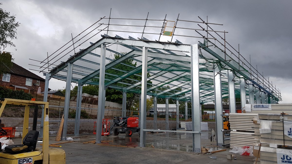lgs_ltd's tweet photo. The steel frame is now up at our #sthelens site, where we are building a row of high spec industrial units. Great progress with support from @Selby_Bolt_Nut @BWCarnaby  @Canham_Norwich  #positivity #construction  #LGS #coldrolled #steelframed https://t.co/9yKgbyRgZr
