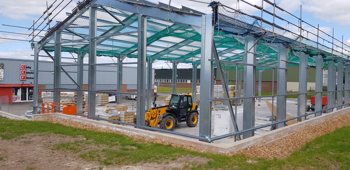 lgs_ltd's tweet photo. The steel frame is now up at our #sthelens site, where we are building a row of high spec industrial units. Great progress with support from @Selby_Bolt_Nut @BWCarnaby  @Canham_Norwich  #positivity #construction  #LGS #coldrolled #steelframed https://t.co/9yKgbyRgZr