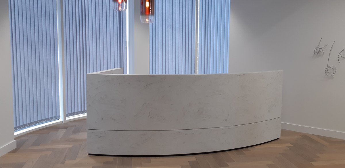 As construction sites open back up, our fitters are back to work in a safe way delivering the quality our clients have come to know. Corian reception desk fitted in London last week. Solid surface is a great material for that seamless finish. #StatementFurniture #BespokeFurniture