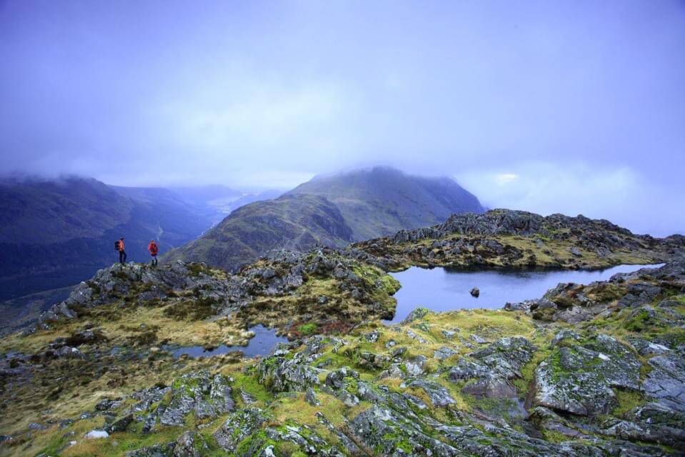 TrailMagazine's tweet photo. This morning we're (virtually) exploring the summit of Haystacks. Our #trail100 peak of the day is Alfred Wainwright’s favourite fell and final resting place, where rocky, craggy coarseness meets the quaint charm of tarns and streams in perfect harmony. https://t.co/XJrrd2cbLU https://t.co/a3hu7RKh52