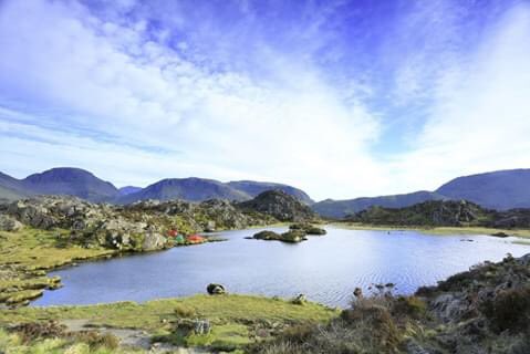 TrailMagazine's tweet photo. This morning we're (virtually) exploring the summit of Haystacks. Our #trail100 peak of the day is Alfred Wainwright’s favourite fell and final resting place, where rocky, craggy coarseness meets the quaint charm of tarns and streams in perfect harmony. https://t.co/XJrrd2cbLU https://t.co/a3hu7RKh52