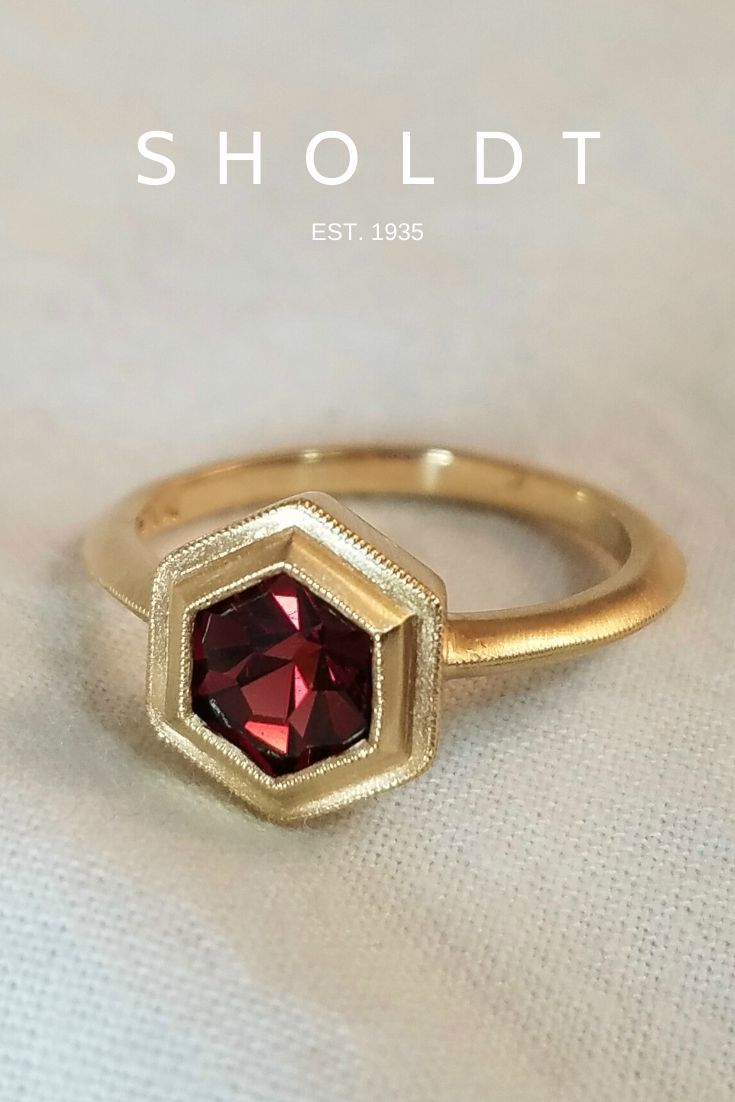 BluKatDesign's tweet photo. “Hexagon garnet ring in yellow gold by Sholdt Jewelers, Seattle WA #GarnetRing #hexagonring #shopsmall” https://t.co/5U5hpfJMmX https://t.co/Rwv5nWo8Bu