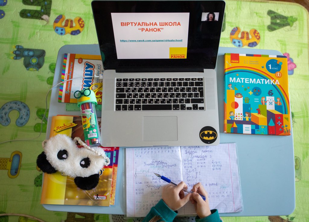 Zlata, 7, works on schoolwork on her laptop at home in Kyiv, Ukraine. <a href="/UNICEF/">UNICEF</a>
