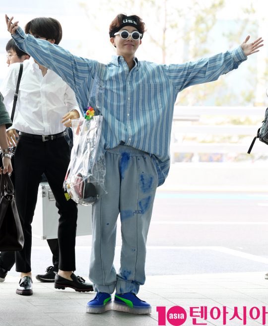 happiest most stylish baby!! look at the details!! rocking the glasses the hairband and the clear ass bag!  #JHOPE