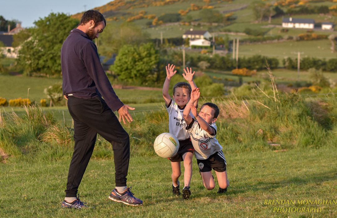 mungo4's tweet image. #Blockdown @KilcooGAC forward and former @OfficialDownGAA  star @ConorLav14 puts his sons Setanta and Conlaoch through their block tackle routine tonight at the Dublin Road Stadium Kilcoo  Picture @mungo4