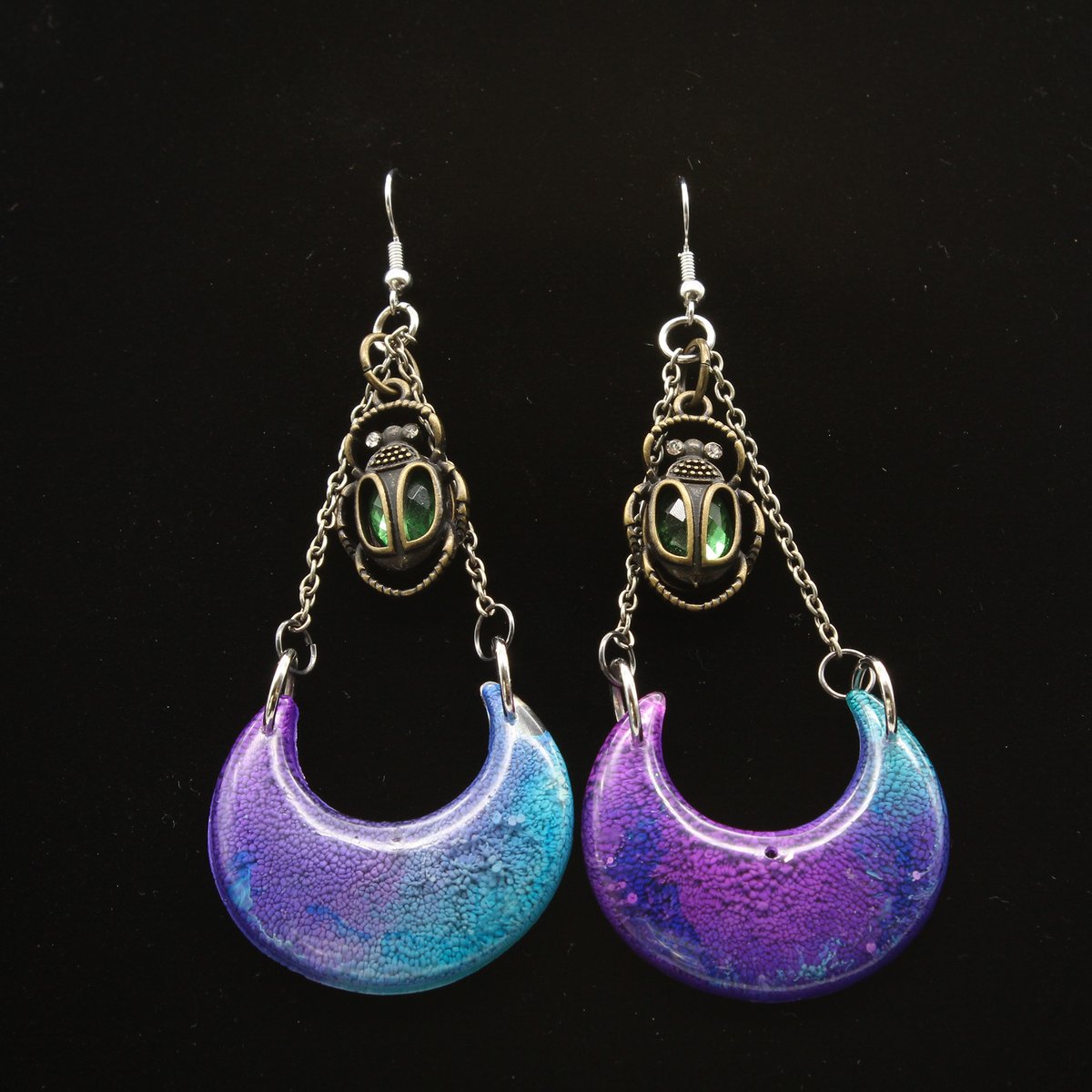 I really love how these earrings came out. I love how the alcohol ink played in the crescent moons. #stargazer #stargazergoods #moonearrings #resin #resinjewelry #resinearrings #alcoholink #purpleearrings #tealearrings #fluidart #oregon #portland #portlandoregon #PNW #PDX