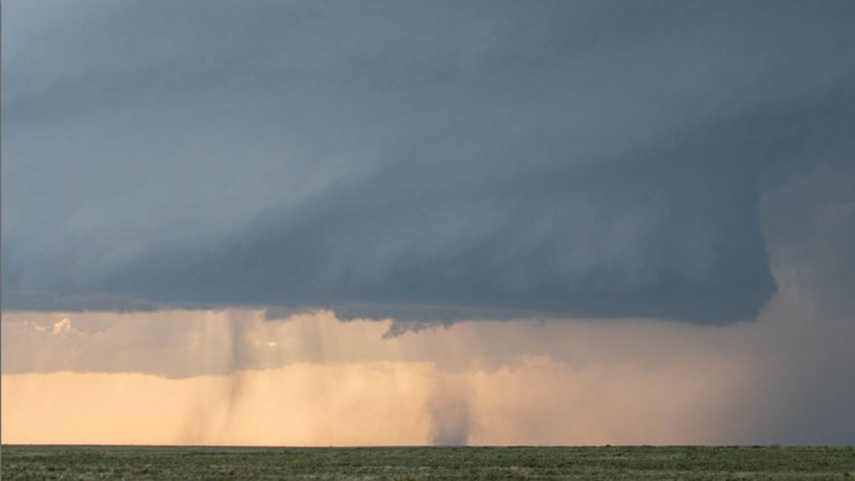 618pm MST The storm is already rotating quickly as the low level jet has kicked in, and quickly produces a landspout that spins for ten minutes.