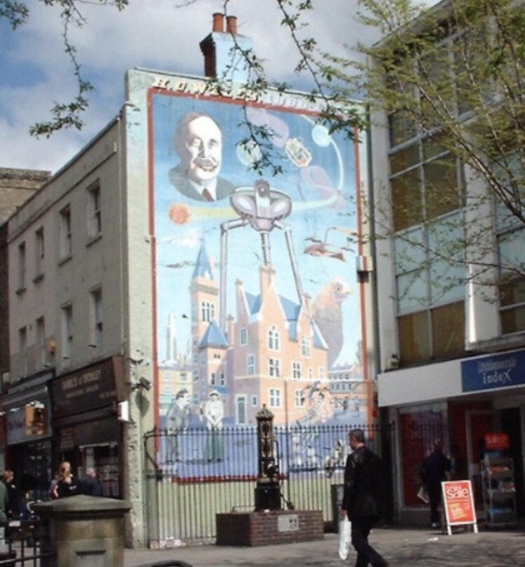 TheWellToldTale's tweet photo. Bromley in SE London used to sport this fantastic mural celebrating H. G. Wells’ connection to his home town. Our last episode of his story “The Invisible Man” is available now here: https://t.co/HY6PjUv8kd but to hear about those tripods, check out our YouTube channel #hgwells https://t.co/DwsspVv6tO