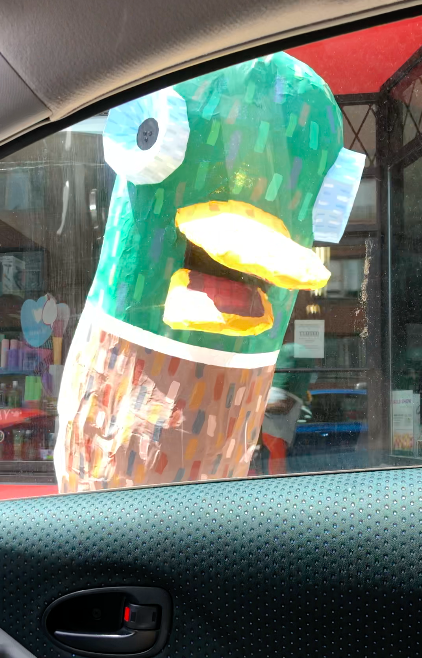 SamBlackUW's tweet photo. I felt such an all-encompassing, ominous, chaotic vibe and looked up to see this weird duck staring into my car. And my soul. #HamiltonDuck #HamOnt https://t.co/z4SiBordBd