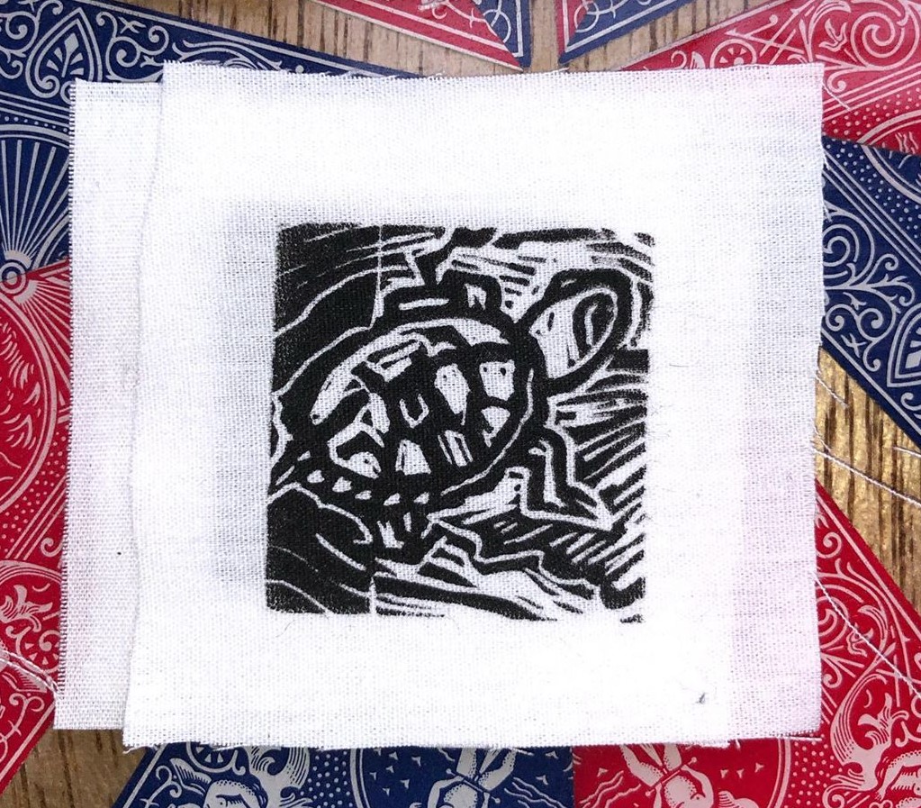 COVID-19 isn't stopping us from supporting local artists! Visit our Greenwood location to peruse and purchase beautiful handmade patches like this one, by "Ink of Extinction". And while you're there, grab a bev and a truffle to take with you!