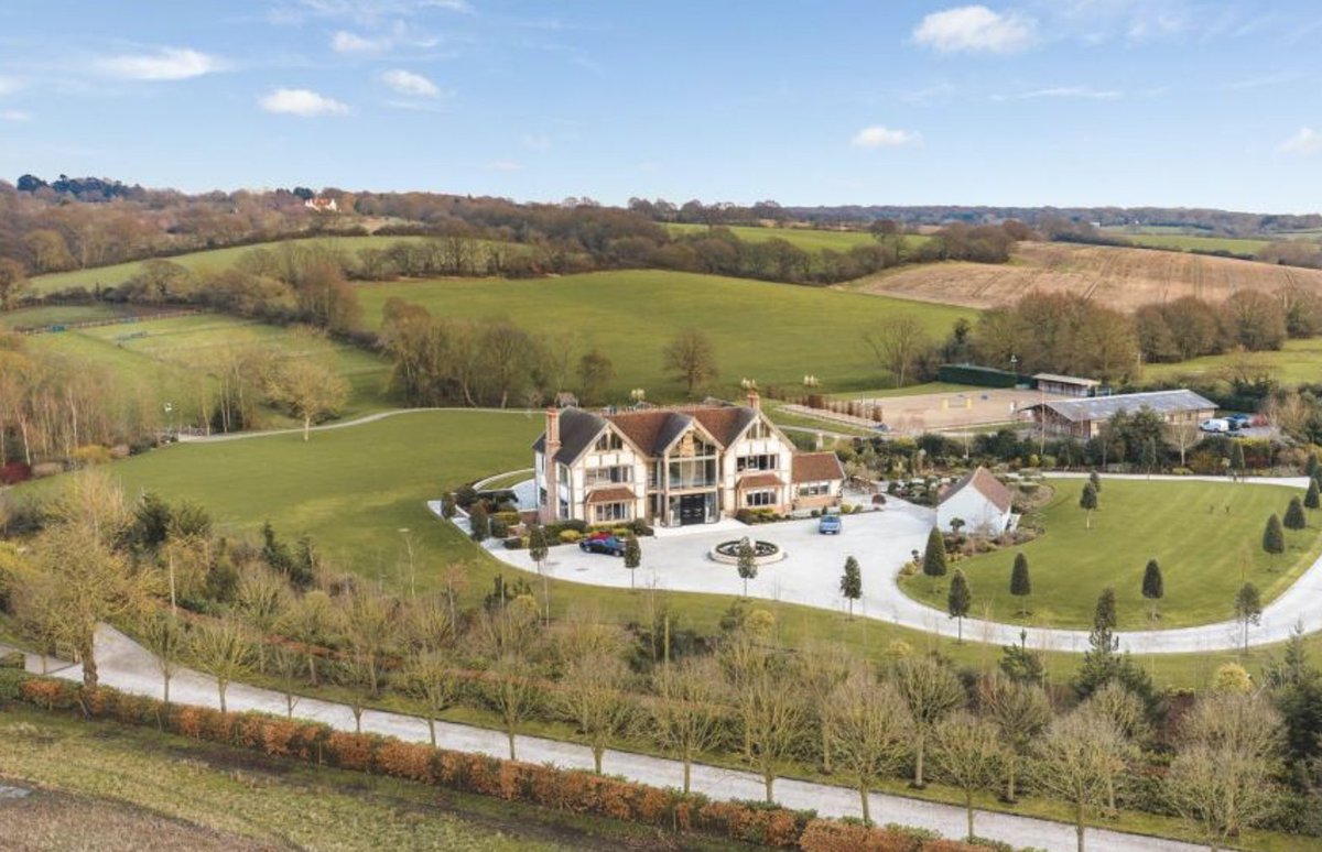 this house is BEAUTIFUL from the outside. but then you notice it has a weird glass panel in the floor of the hallway?? what's below it.. an amazing pool! wow! but what do you do when the Ocado bloke comes and your husband is in the pool below naked? also velour cinema. no.