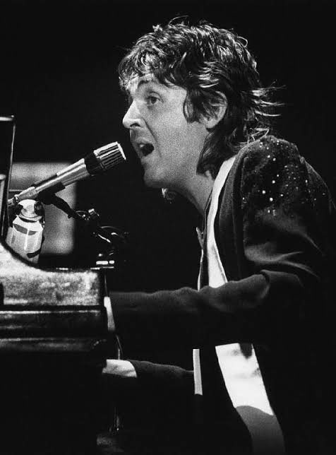 Paul McCartney but he gets older as you scroll down.