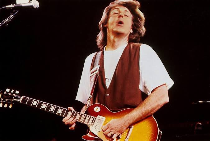Paul McCartney but he gets older as you scroll down.
