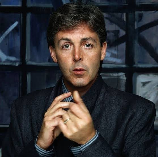 Paul McCartney but he gets older as you scroll down.