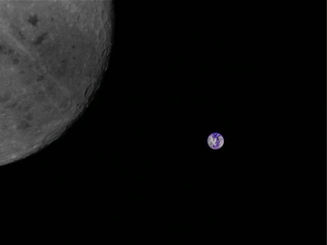 A student-developed and operated camera has been used to take images of the Moon and Earth which have been downloaded by radio enthusiasts around the world.