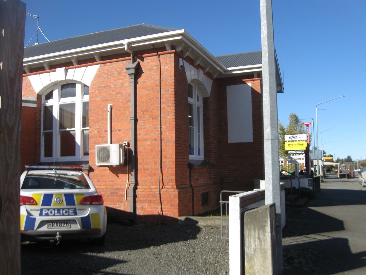 Still more Main St photodocumentary pre & post Covid: Otautau Police Station history: 1. Centre building is old Police Station & Residence, with cells at back, c1950s, CC BY. 2. Moved to what was the BNZ building, Black Friday floods 1984, CC BY; 3 & 4. Now Police Station, CC BY.