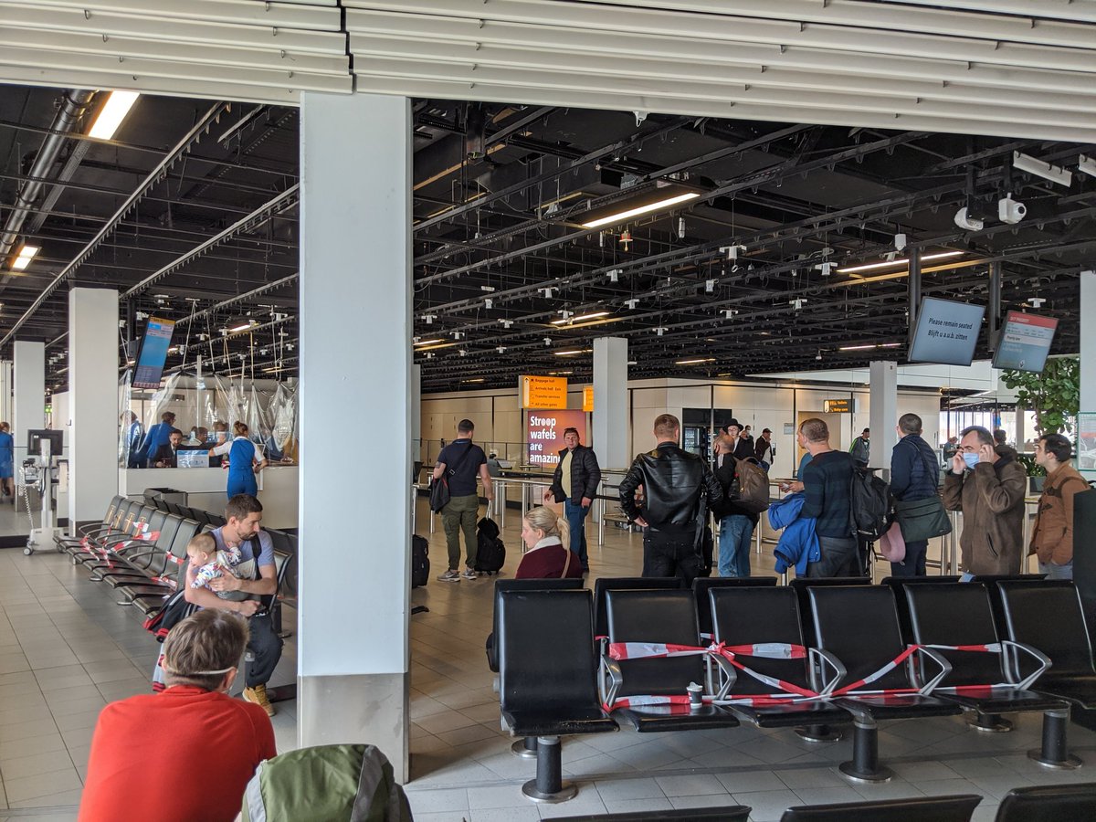 The Amsterdam  @Schiphol transit in a few words and points. 1) no one has taken the health form I filled out before departure to AMS. 2) no temperature checks. 3) main shops and stores open. 4) great experience, good social distancing reminders.5) very safe.