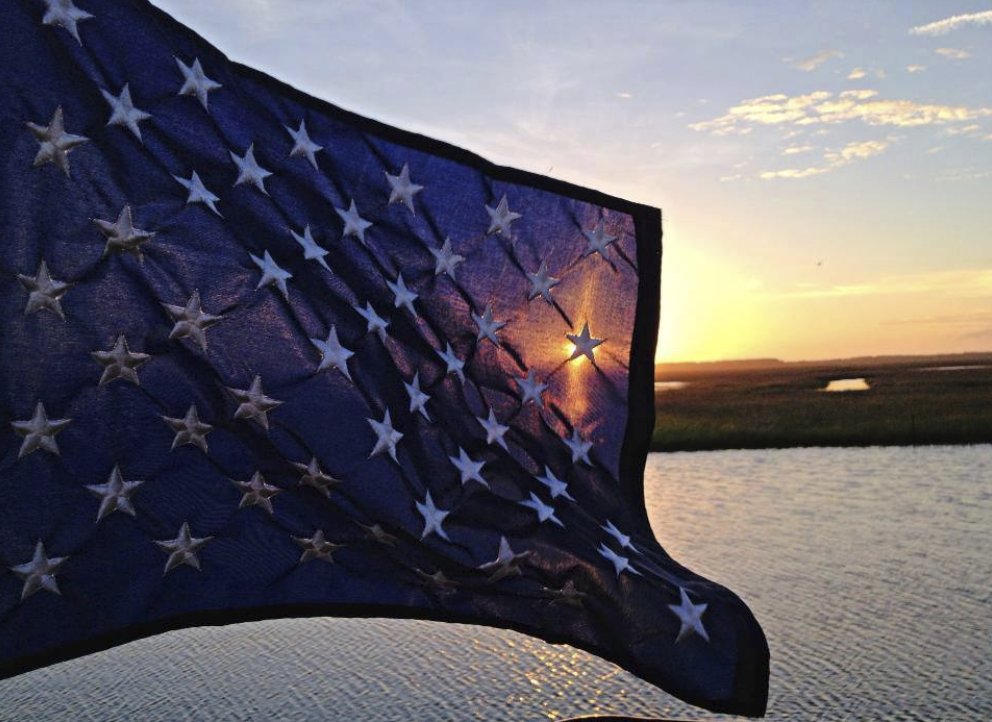 USCG's tweet image. Today we pause and reflect upon all who have given their lives in the ongoing effort to protect our freedom. We will never forget them. #MemorialDay