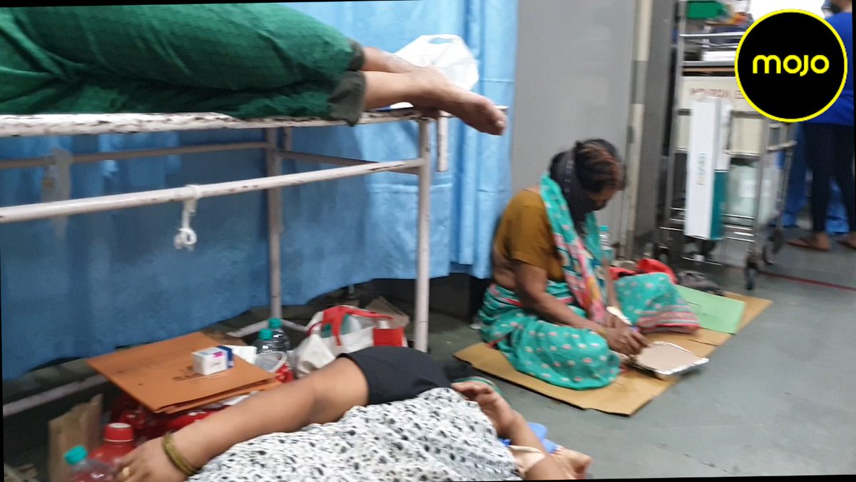 BDUTT's tweet photo. For 3 days in Mumbai we traced how Public Hospitals are overstretched. These disturbing images are of COVID &amp; suspected COVID patients on the floor, cardboard strips, stretchers, as they await beds. Hospitals overrun is no aspersion on heroic doctors. Full story at 9 @themojo_in https://t.co/col8yFxS7s