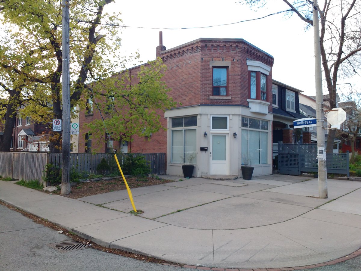 Some of the clues to a former corner shop:- angled corner door, or recessed door- boxy build (flat roof, no porch, door flush to ground)- paved over front yard- full-width front windowMore here:  http://spacing.ca/toronto/2020/05/25/reid-spotting-and-reviving-the-neighbourhood-corner-commercial-building/