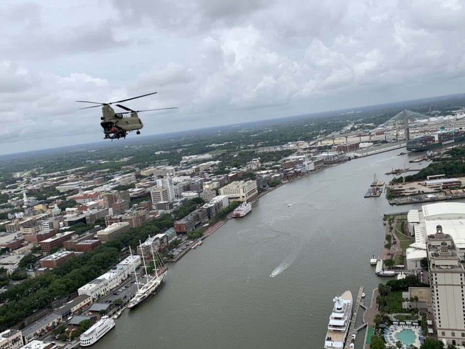 GeorgiaGuard's tweet photo. #HappeningNow: Our 78th Aviation Troop Command is currently up the Savannah River and past River Street. πΊπΈ #GeorgiaGuardRemembers #MemorialDayFlyover #NeverForget https://t.co/jmrBA8qcXV