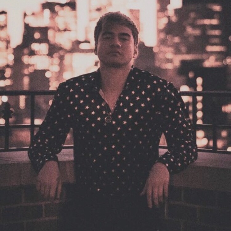 calum hood wearing colourful clothes; a thread