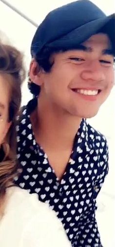 calum hood wearing colourful clothes; a thread