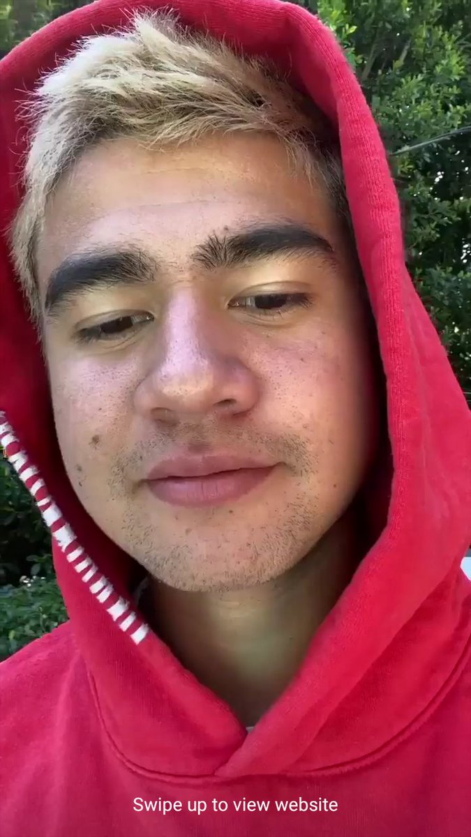 calum hood wearing colourful clothes; a thread