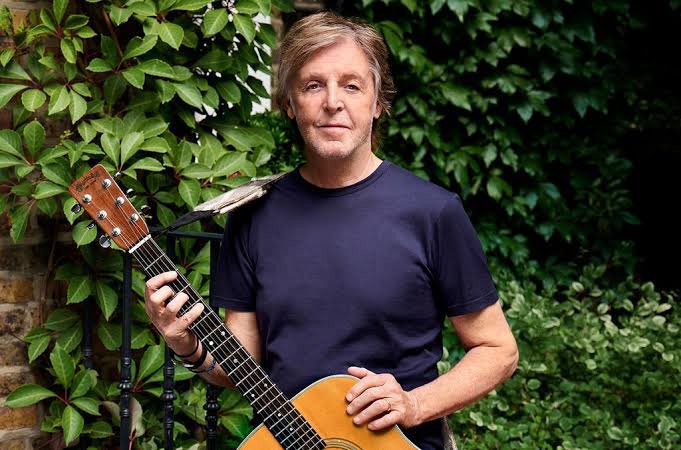 Paul McCartney but he gets older as you scroll down.
