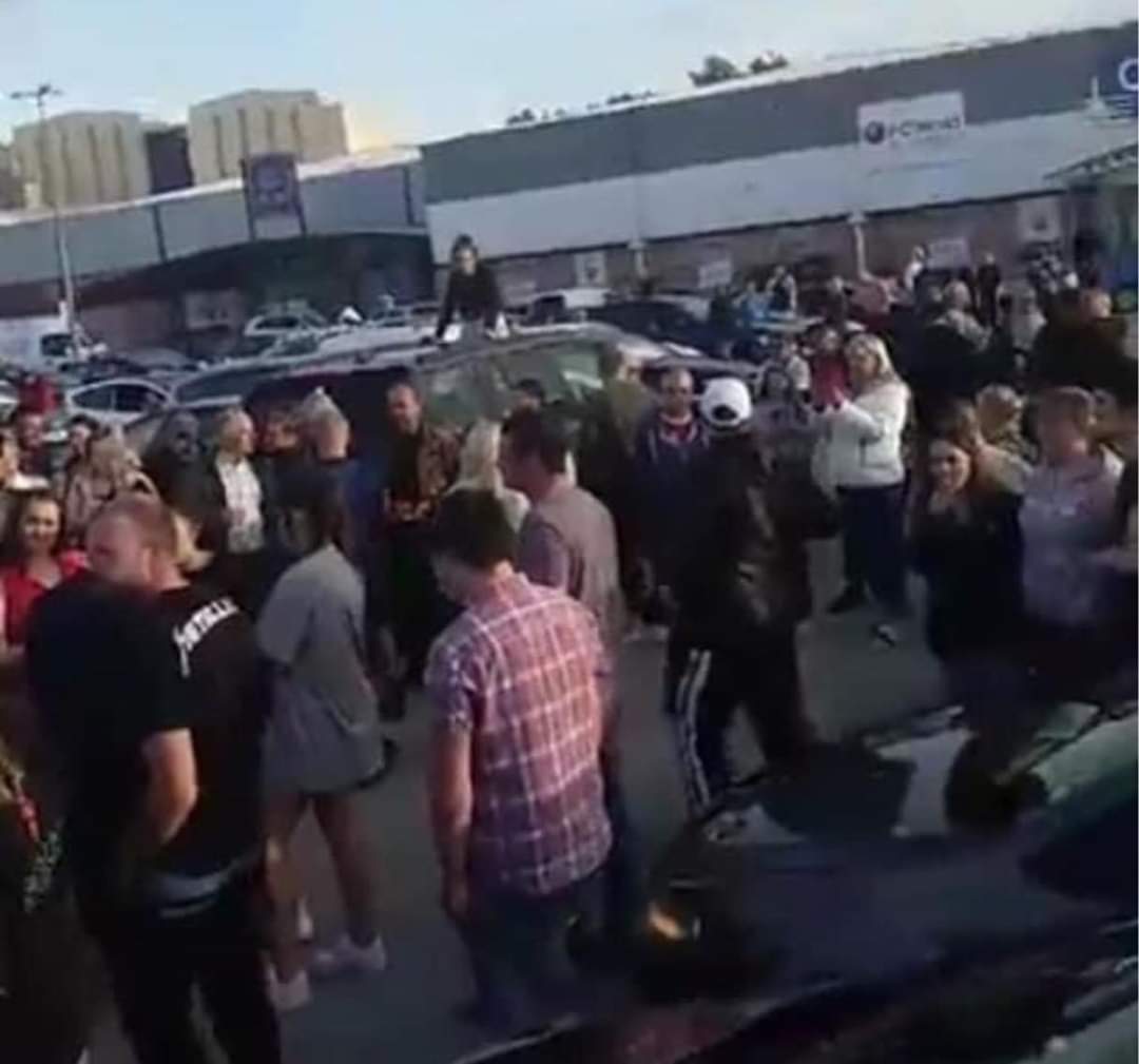 WHAT ARE YOU DOING?! Remember COVID-19 the global virus that has killed hundreds of thousands of people. This is really sad to see. #TommyRobinson is in #Barrow and huge crowds are gathered on Hollywood Park and social distancing is non exsistent. Get in your cars and go home!