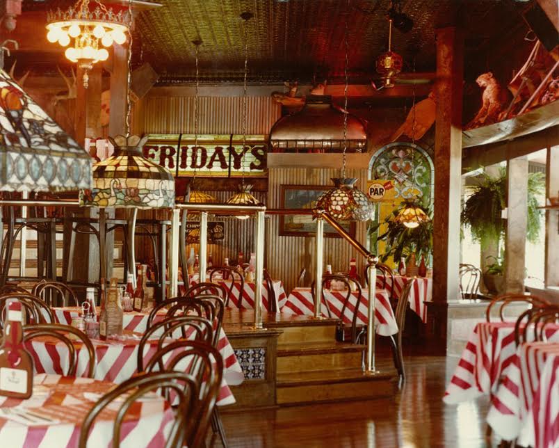 Here's a TGI Friday's from the 90s. They were crowded and nuts! I love the table cloths with TGIF Colors and stained glass tiffany lamps.