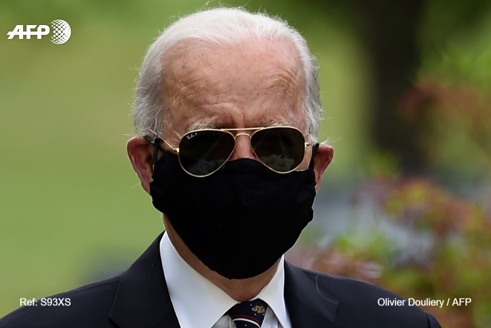 Joe Biden, the presumptive Democratic presidential nominee, emerged from more than two months seclusion Monday, wearing a black face mask during a visit to lay a wreath on the day the United States honors its war dead