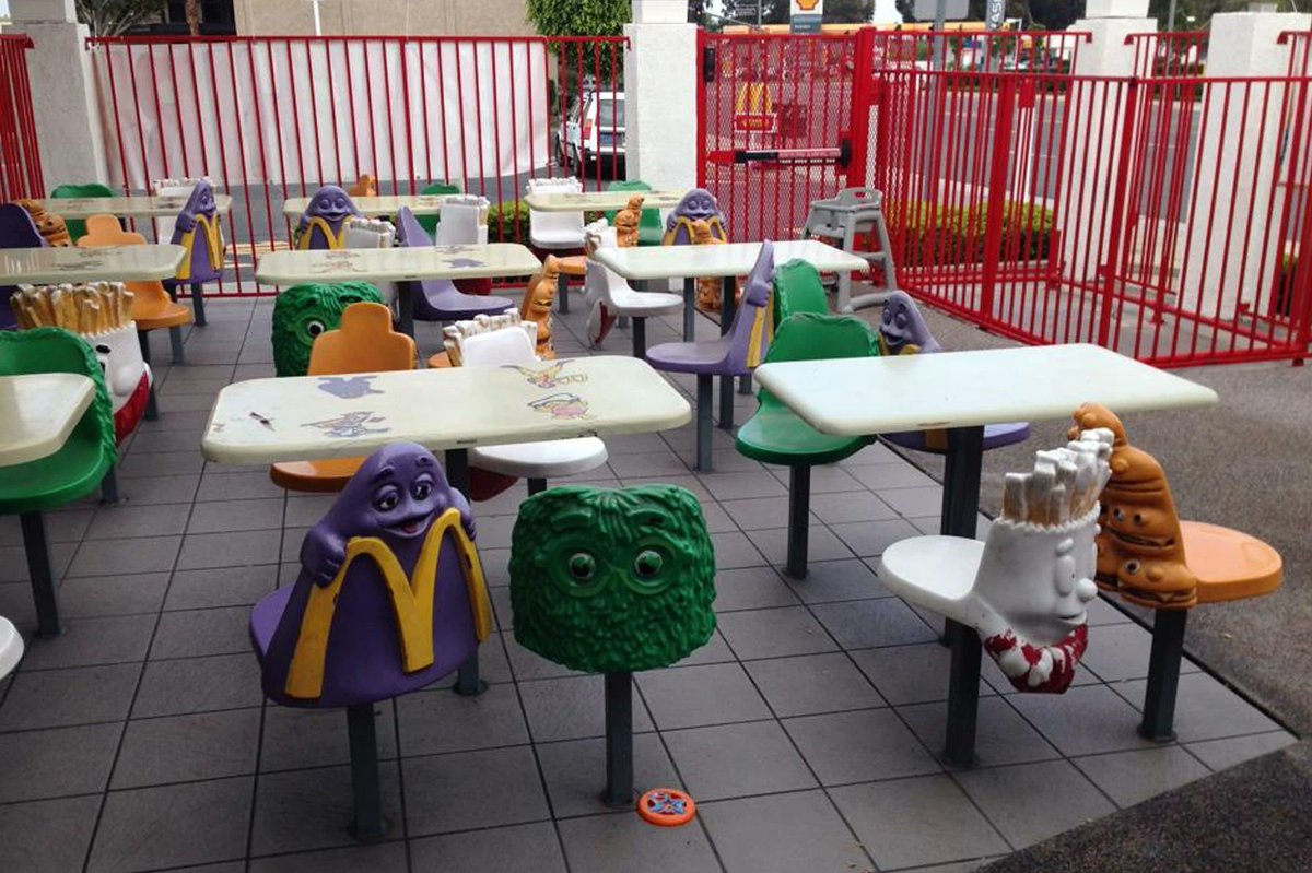 90s McDonalds outdoor patio with McDonaldLand mascots.
