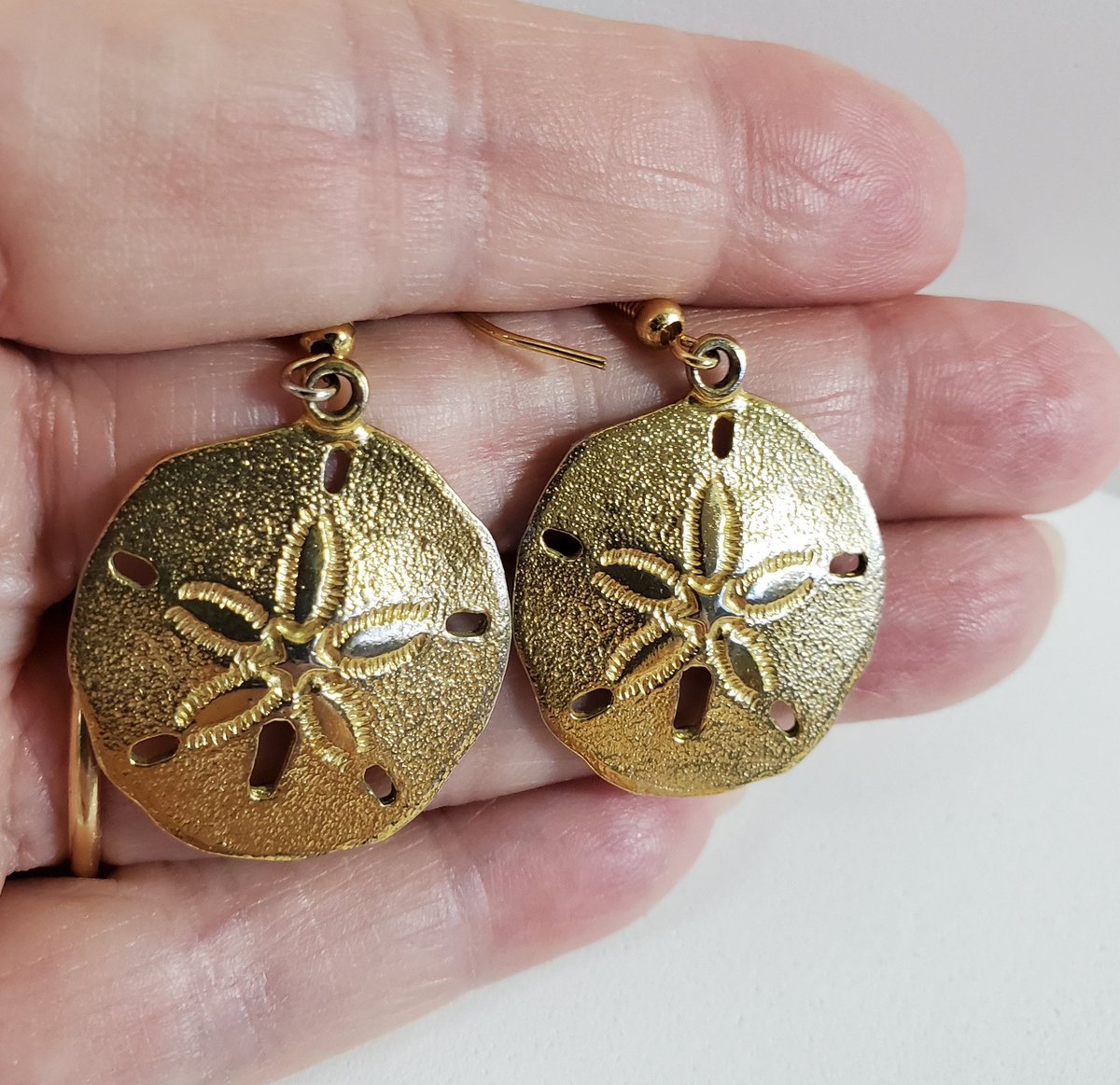 Excited to share the latest addition to my #etsy shop: Earrings Sand Dollar Dangle Style Gold Plated Handmade Jewelry Nautical Earrings Gifts For Her Fashion Earrings Everyday Earrings #women #earlobe #earwire #gold #sanddollarearrings etsy.me/2A3Dgem