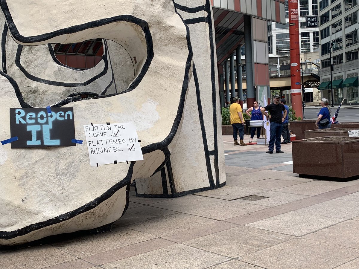 I’m at the latest rally at Thompson Center to reopen Illinois. There’s a small group of people mulling around with signs and the Beastie Boys’ “Fight for your Right to Party” is blaring over a set of speakers.