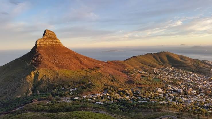 These rocks were manipulated by humans to look like human beings. If you've seen the so called Lions head in Cape Town. You will notice that this is actually a Sphinx, especially from a birds eye view, one can see the whole body of this lion. Is it man made? I don't know.